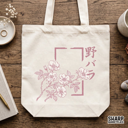Vintage pink wild roses botanical art graphic with Japanese text in a coquette y2k style for apparel prints
