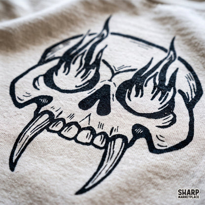 Woodcut fanged skull design with eye flames for Halloween t-shirts and gothic streetwear PNG clipart