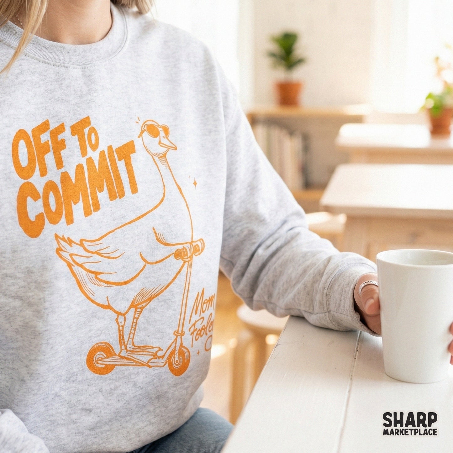 Trendy monochromatic orange design of a goose on a scooter with the sarcastic phrase Off To Commit Mom Foolery for custom sublimation projects.