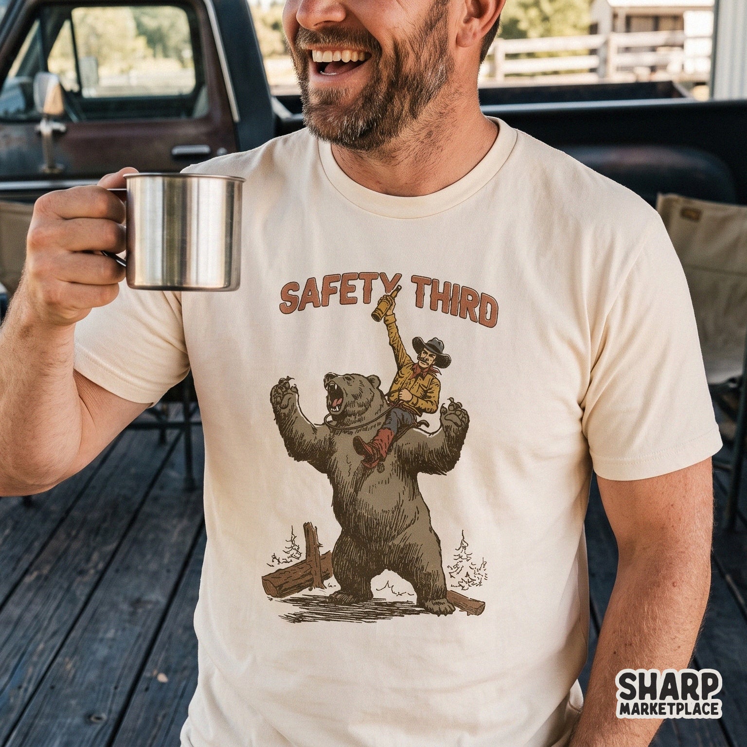 Funny cowboy riding a bear graphic with Safety Third text in a retro western style for camping and humor shirts