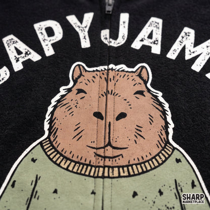 Cute capybara wearing green pajamas illustration transparent PNG graphic for funny nightwear t-shirts and sublimation