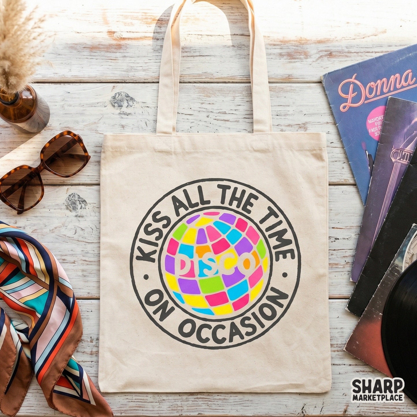 Trendy Y2K style circular badge design with a vibrant multi-colored disco ball and groovy typography for custom t-shirt and apparel printing.