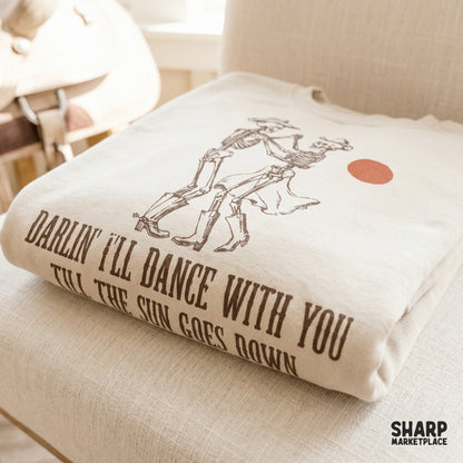 Western themed digital illustration of a skeleton cowboy and cowgirl waltzing, perfect for DIY apparel, sublimation transfers, and custom t-shirt projects.