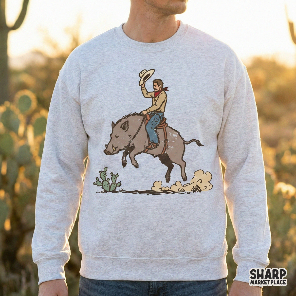 Western rodeo digital graphic featuring an outlaw cowboy on a saddled boar, perfect for sublimation, t-shirts, stickers, and custom desert-themed apparel.