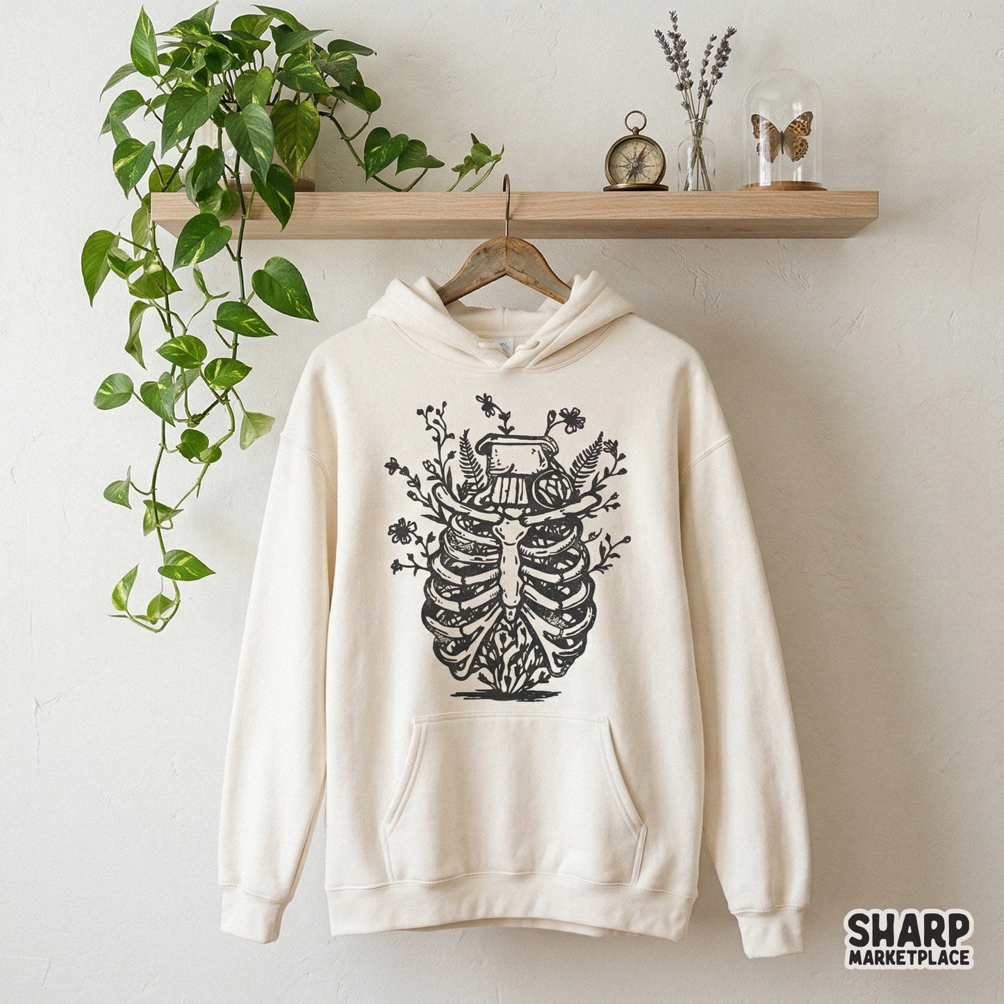 Botanical rib cage design with delicate flowers and leaves, perfect for sublimation on t-shirts, tumblers, or creating gothic garden wall art.