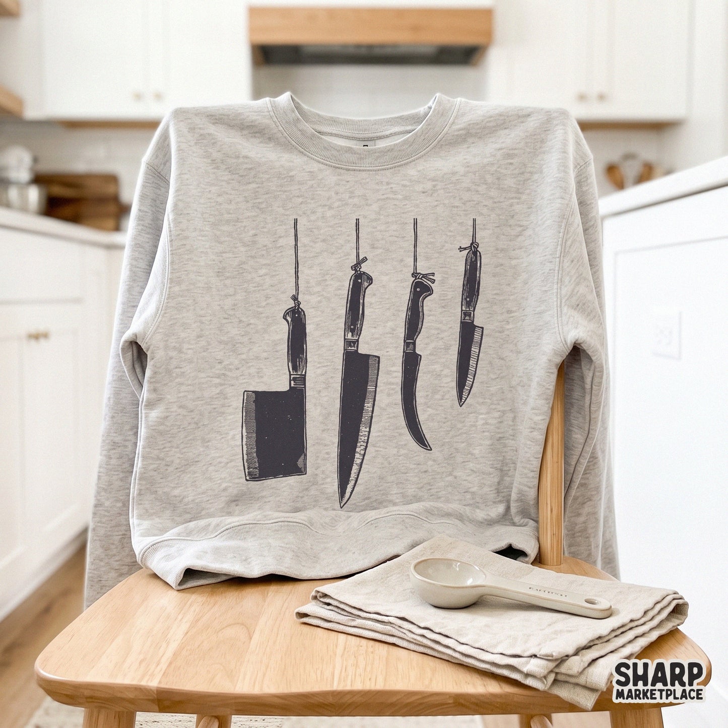 Hanging butcher knives in a retro dark art style for true crime fans and spooky season Halloween apparel designs