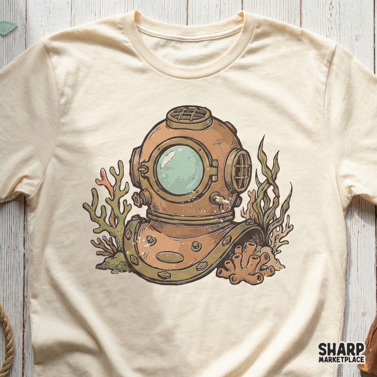 Retro deep sea diver helmet graphic printed on a cream colored t-shirt, featuring a distressed nautical style for apparel and sublimation.
