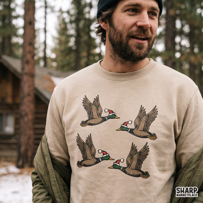 Flying mallard ducks wearing Santa hats festive Christmas PNG sublimation graphic design for holiday hunting apparel