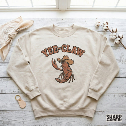 Western coastal sublimation graphic showing a lobster in a cowboy hat with distressed brown typography, ideal for custom tumblers and DIY gifts.