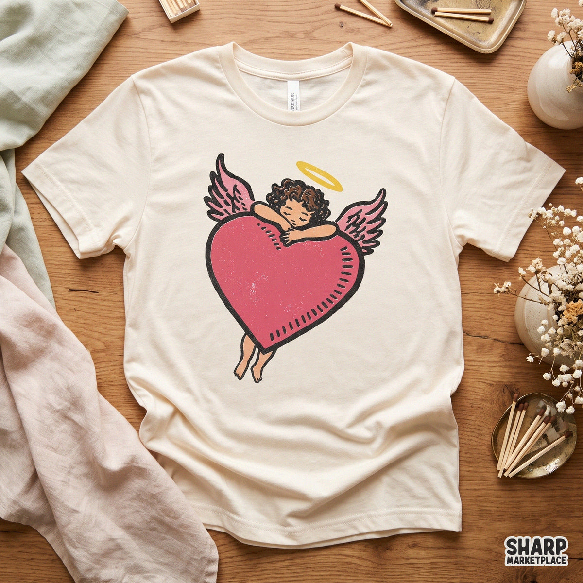 Vintage cherub angel hugging a red heart Valentine PNG shirt design for sublimation