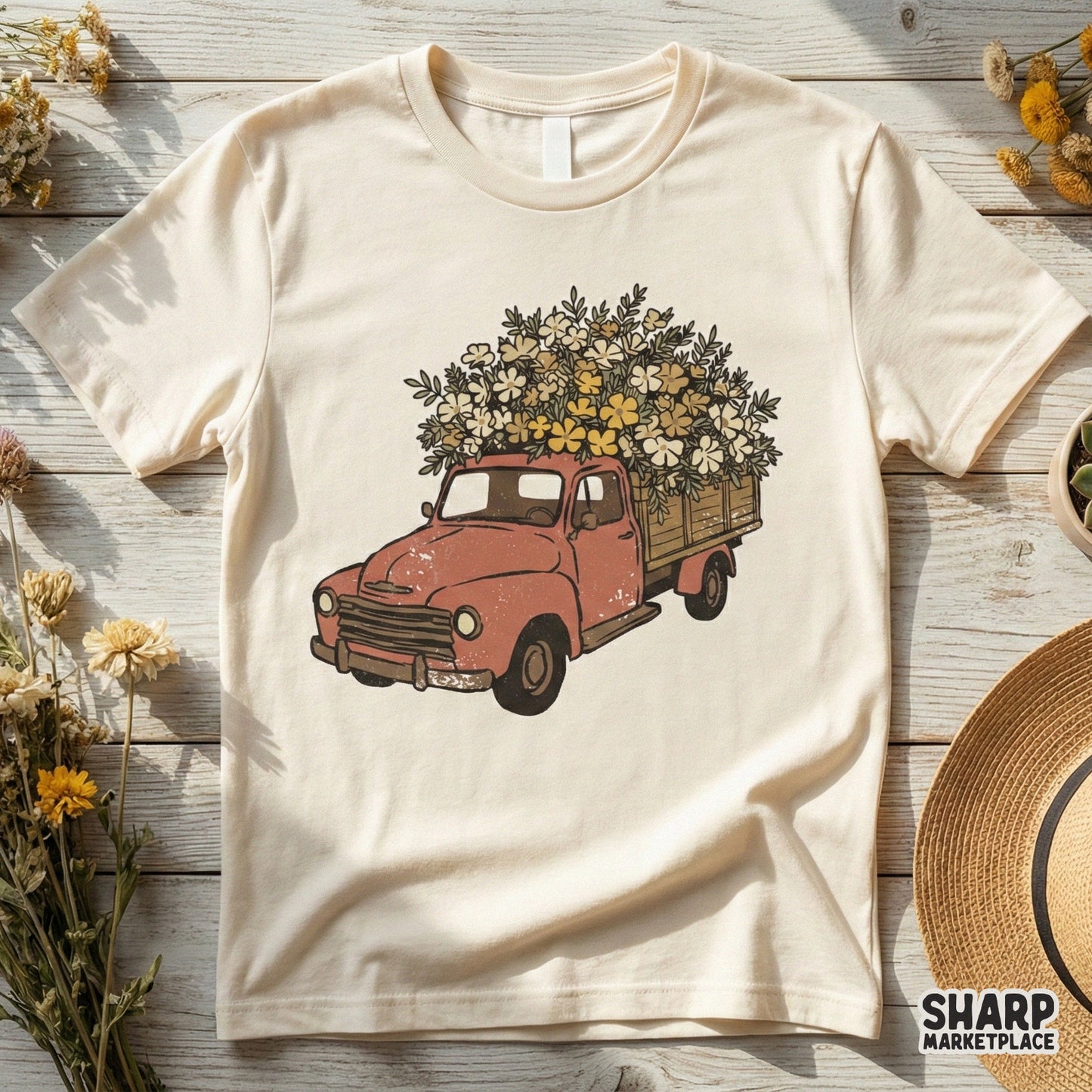 Cream-colored t-shirt mockup displaying a vintage red truck design overflowing with spring flowers, perfect for rustic apparel and sublimation projects.