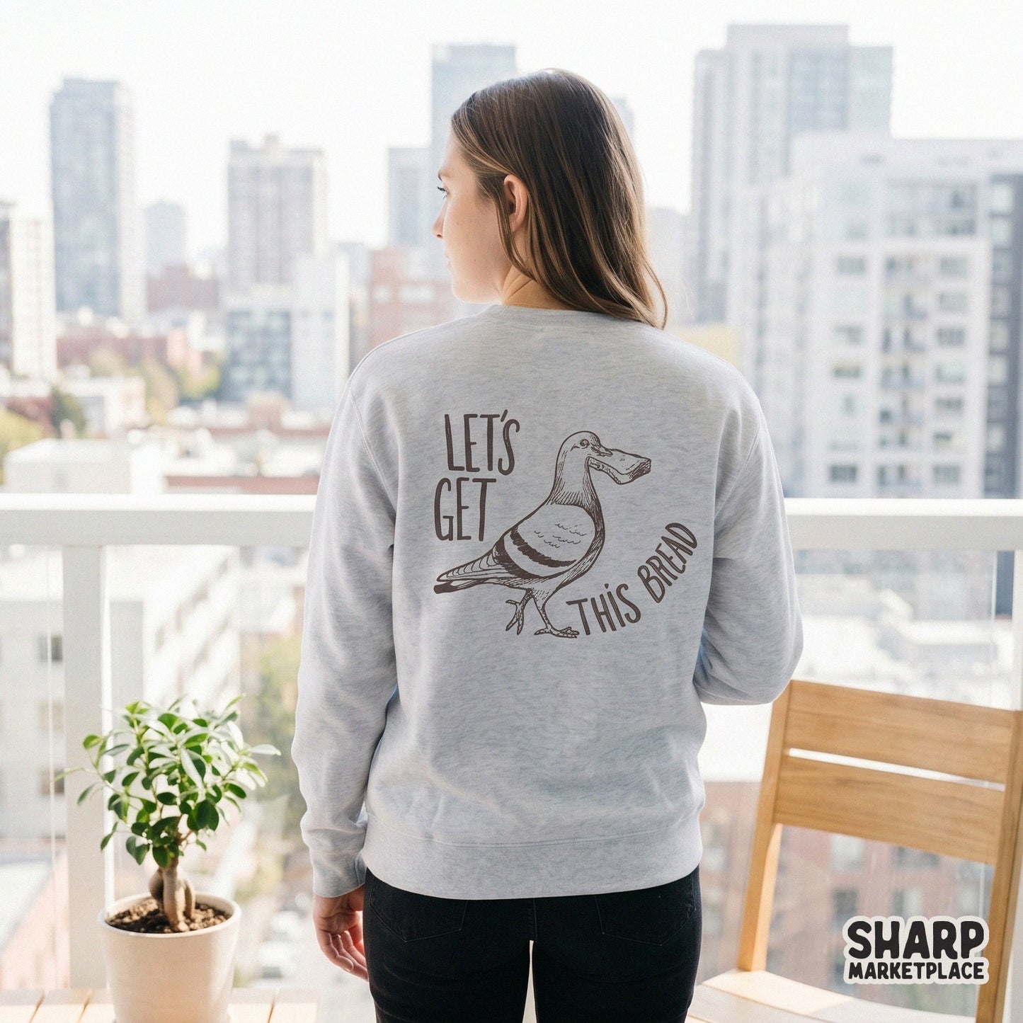 Monochromatic brown illustration of a city bird carrying bread, designed for DTF transfers, sublimation projects, and humorous DIY gifts.
