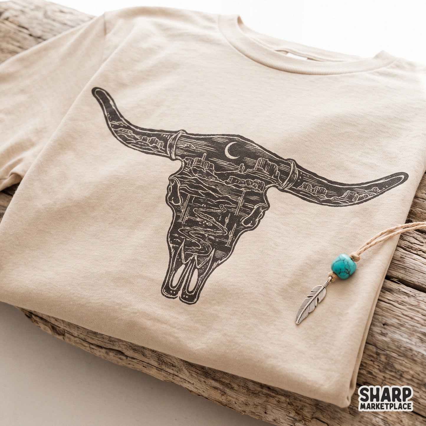 Vintage desert landscape bull skull illustration with cacti and night sky for western boho country music shirt designs