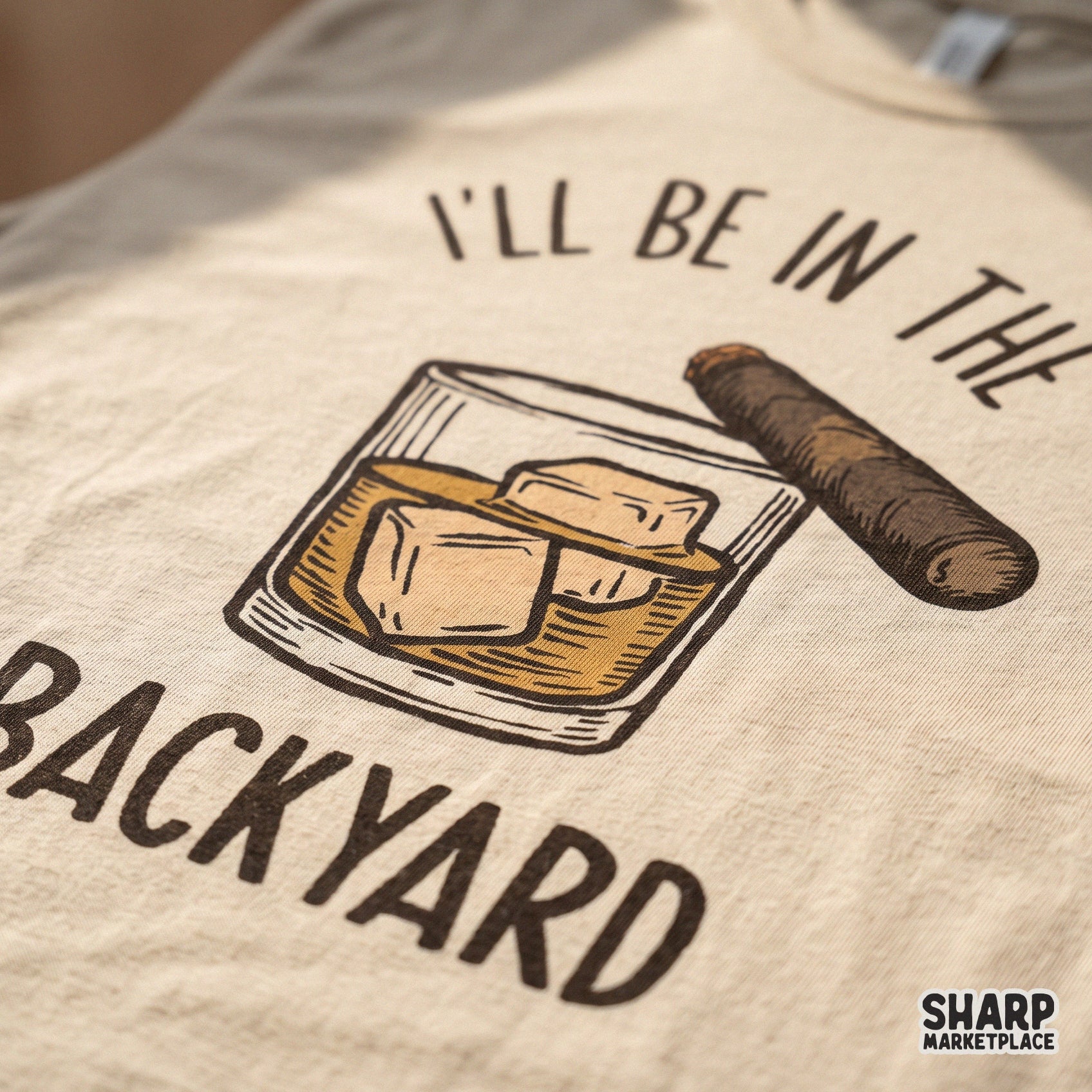 Retro whiskey and cigar illustration with I'll Be In The Backyard text for funny Father's Day shirts and summer gifts