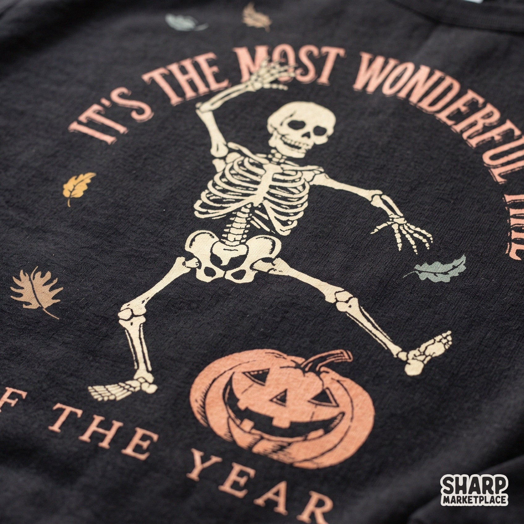Dancing skeleton Halloween PNG with retro pumpkin and skull design for spooky season apparel and fall decor products