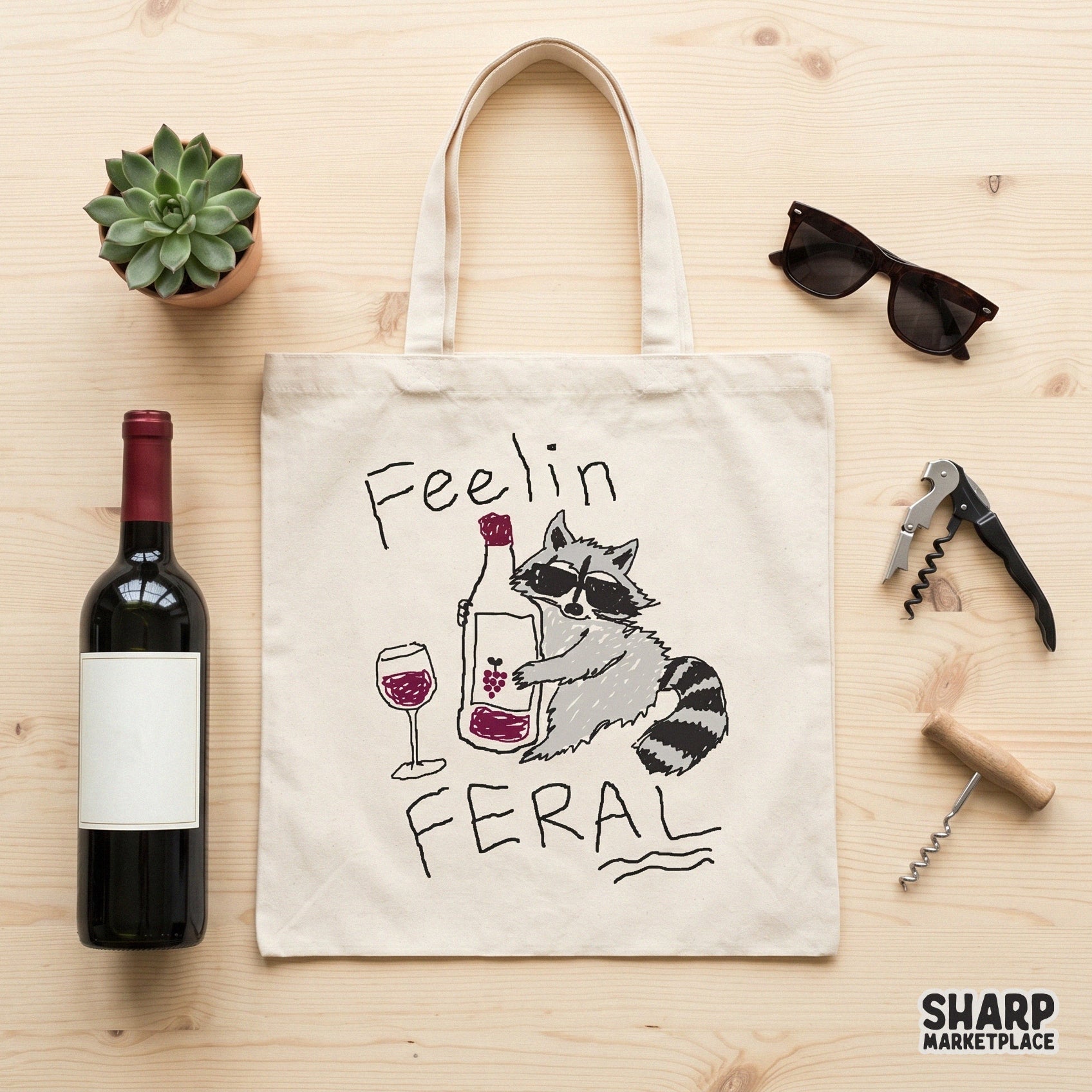 Digital graphic of a cute raccoon with sunglasses and a wine bottle, perfect for DIY stickers, shirts, or wine-themed sublimation projects.