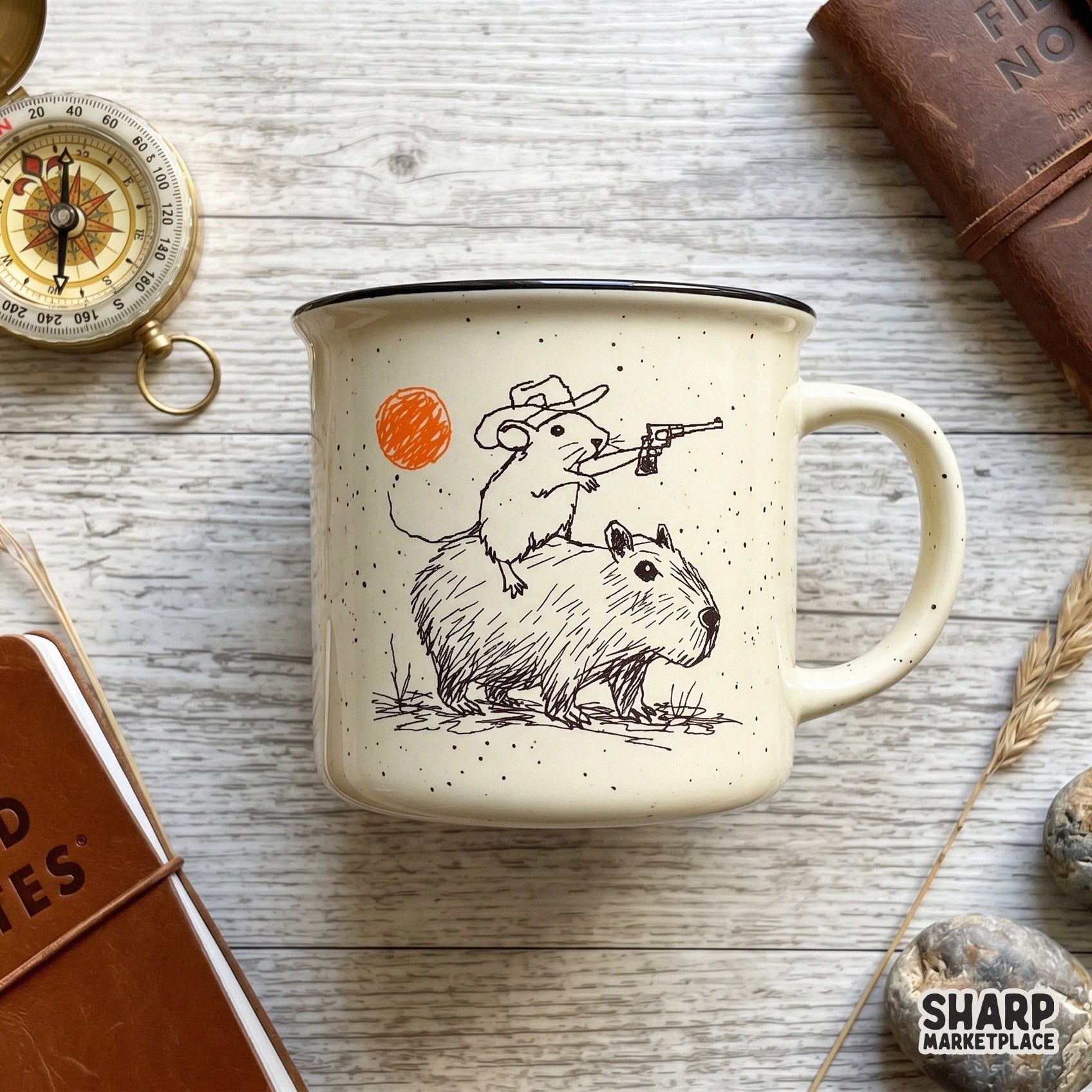 Whimsical western sketch design featuring a rat outlaw on a capybara, printed on a speckled ceramic mug for a trendy and funny apparel aesthetic.