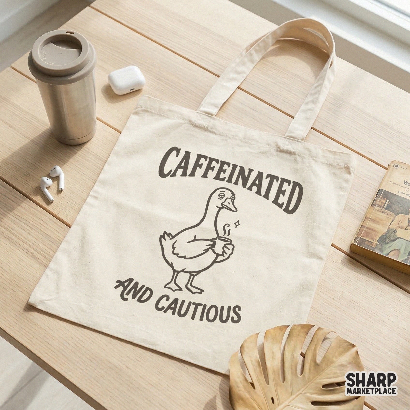 Monochromatic digital design of a sleepy duck holding a coffee mug with the phrase Caffeinated and Cautious, ideal for sublimation and apparel printing.