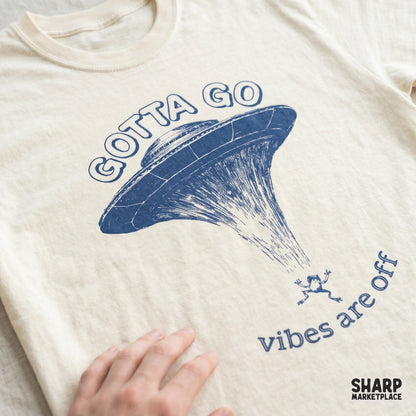 Funny sarcastic frog UFO abduction design for a retro vintage sublimation shirt