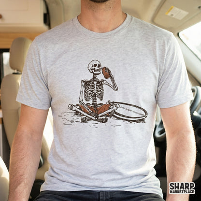 Humorous dead chill skeleton design with a surfboard and coconut, suitable for creating unique coastal Halloween shirts or DIY vacation gifts.