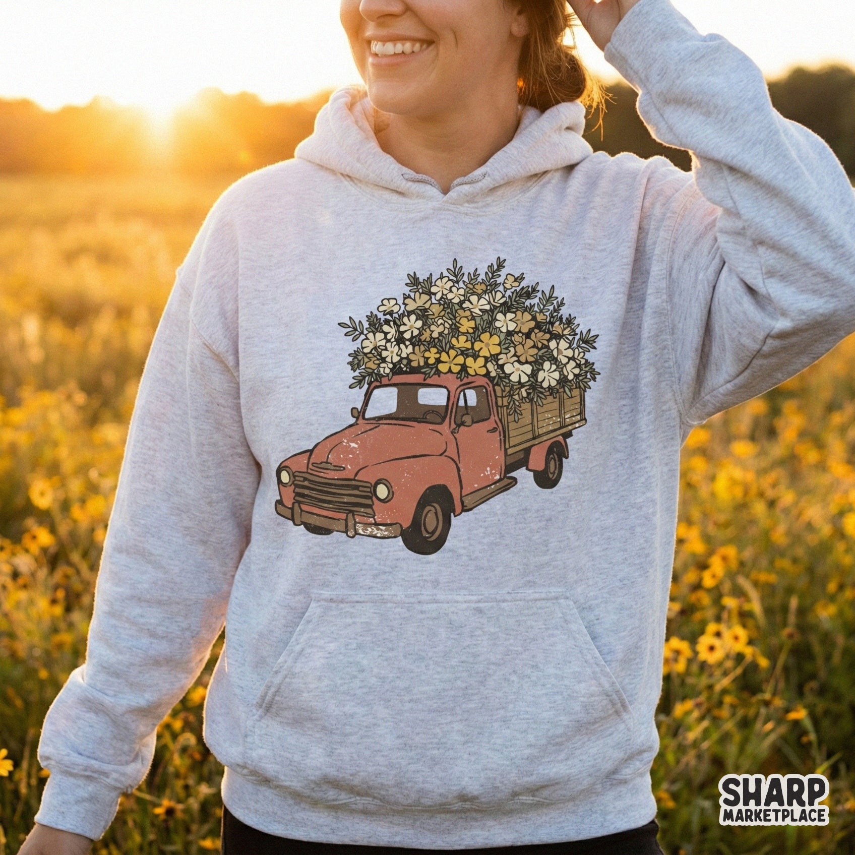 Distressed vintage truck design filled with a lush bouquet of yellow blossoms, suitable for printable wall art, custom apparel, and DIY craft projects.