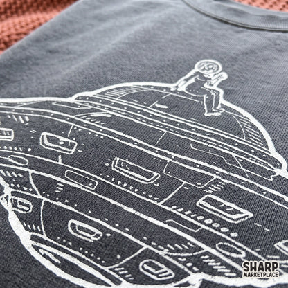 Astronaut chilling on top of a flying saucer UFO, trendy space shirt graphic for sublimation and DTF prints