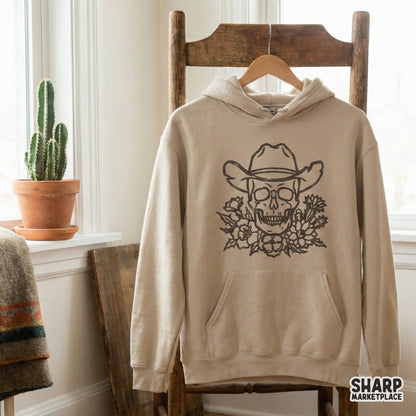 Vintage-style cowboy skull illustration with desert blooms and cacti, ideal for creating custom stickers, tumblers, or rustic western wall art.