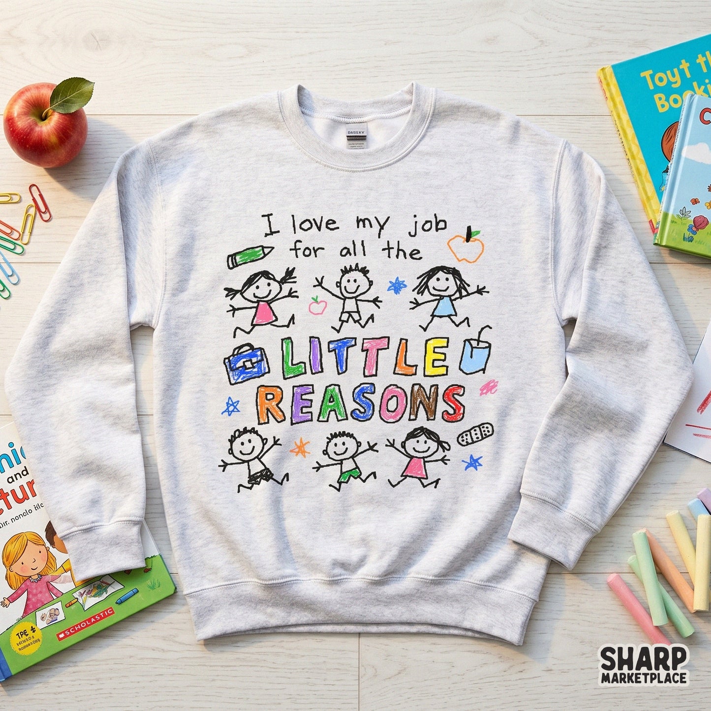 Whimsical teacher-themed sublimation graphic with childlike crayon sketches of smiling children and school icons, perfect for custom apparel and gifts.