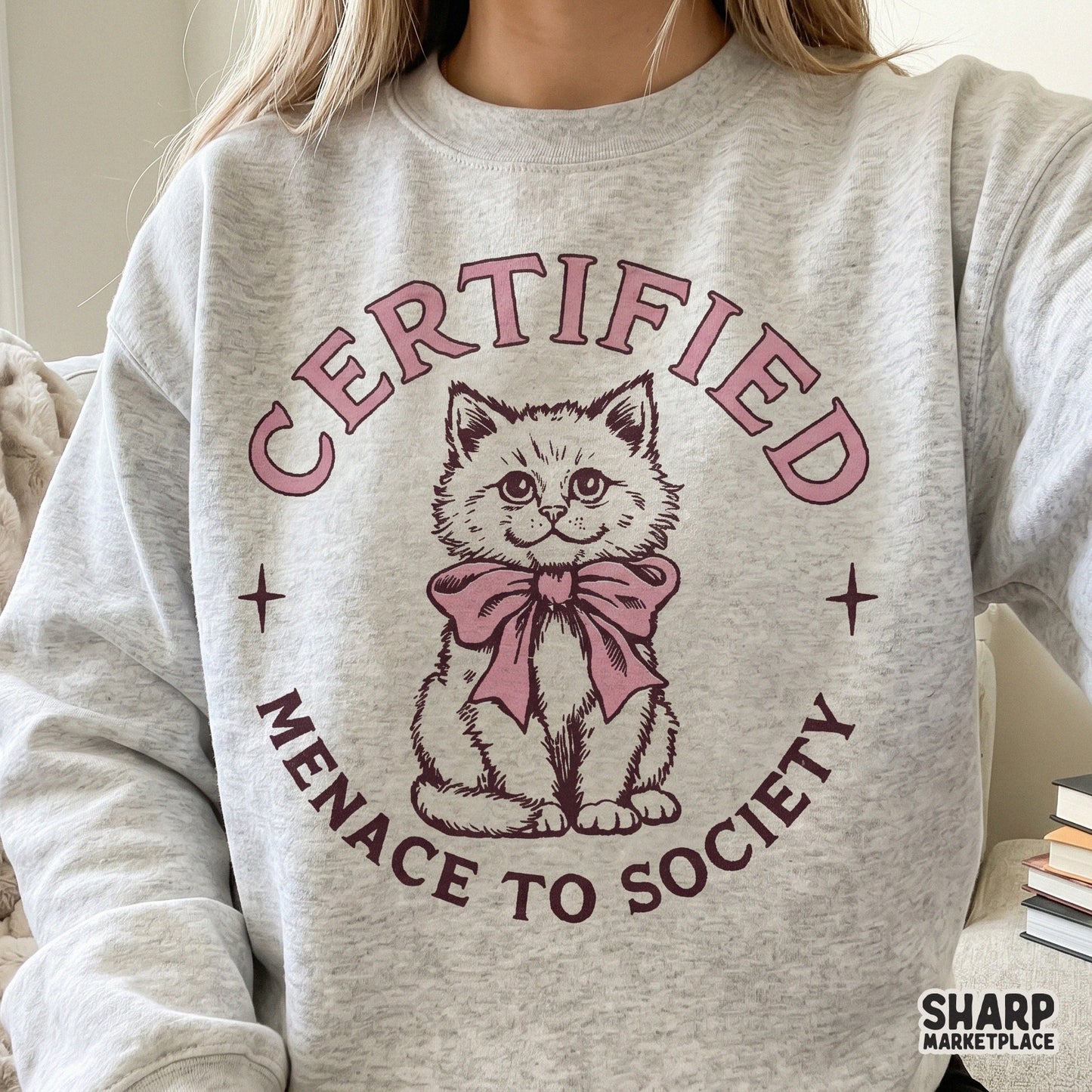 Funny kitten menace to society graphic with a pink bow in a trendy retro y2k coquette png style for cat lovers
