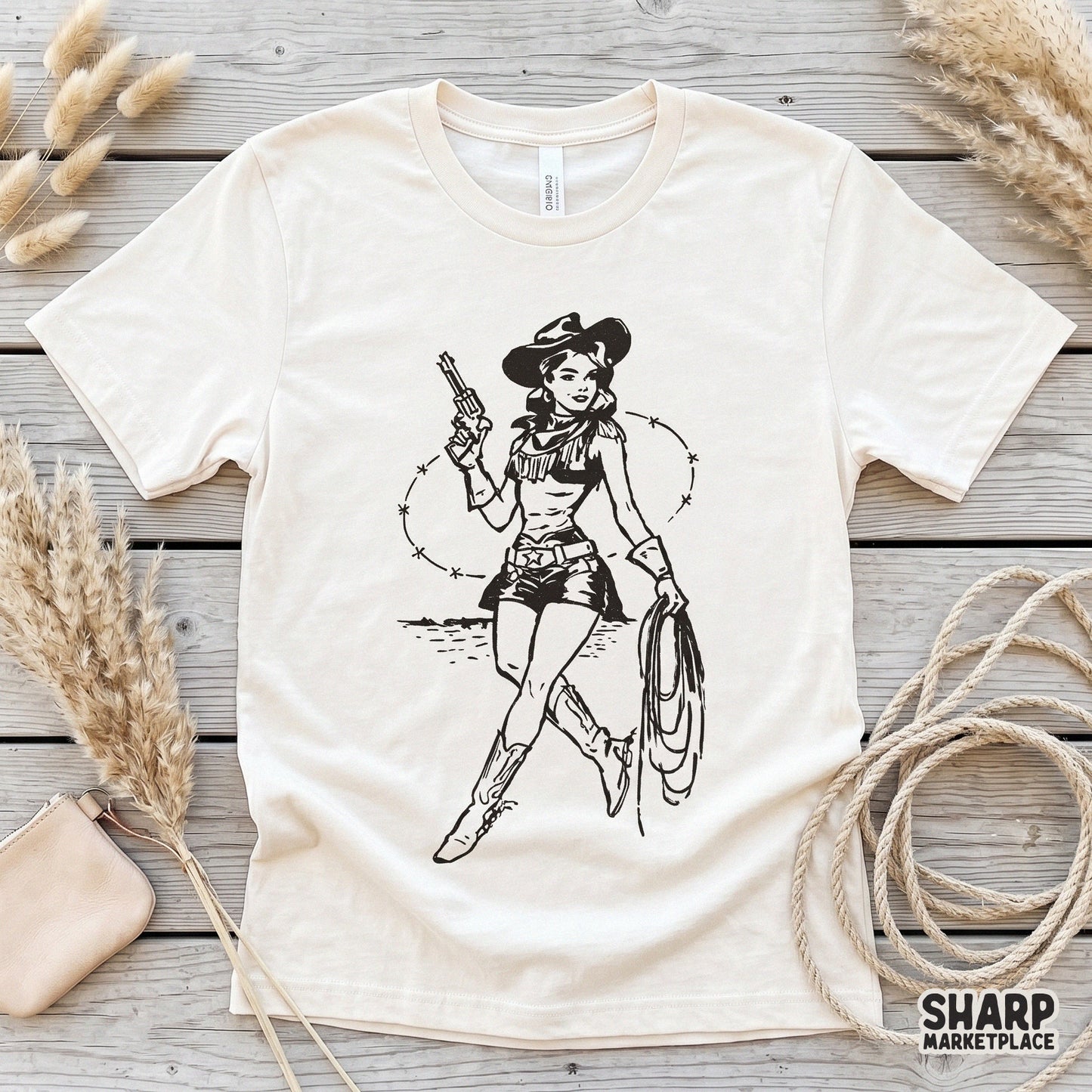 Monochromatic black ink drawing of a stylish cowgirl holding a lasso and pistol, perfect for creating custom western stickers, tumblers, or wall art.