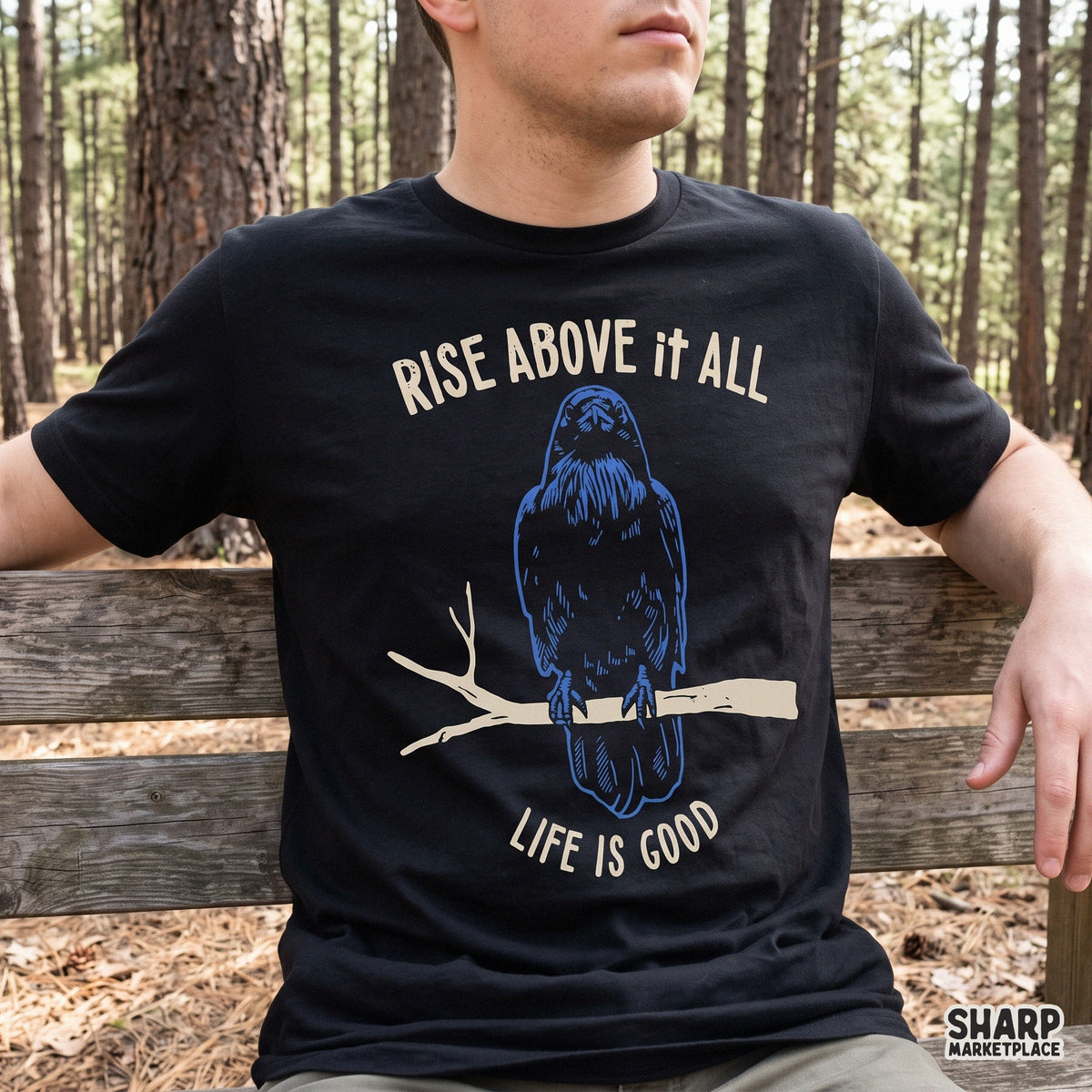 Blue crow raven graphic with Rise Above It All inspirational quote for spooky Halloween sublimation shirt PNG design