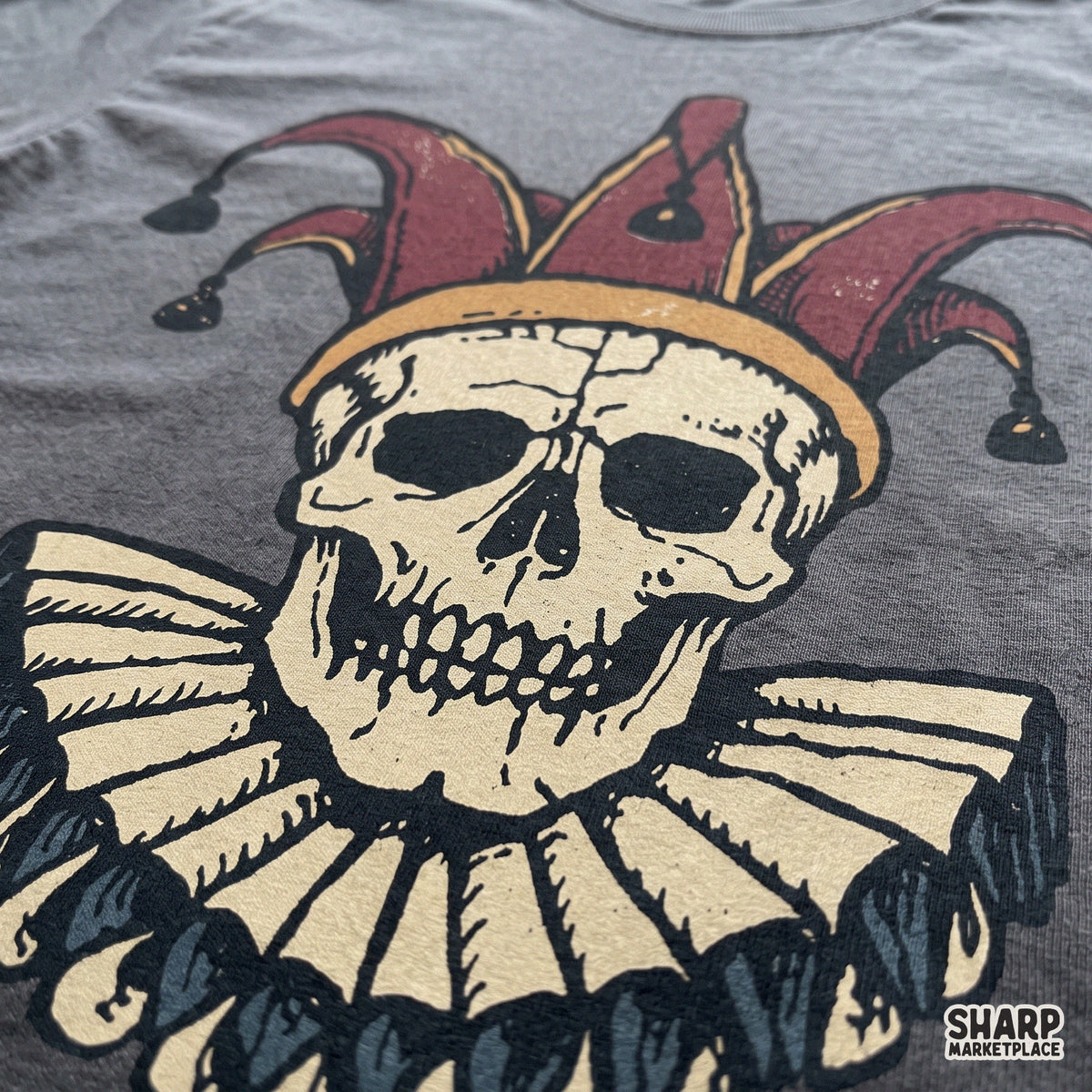 Spooky medieval jester skull with ruffled collar and fool hat retro Halloween PNG graphic for t-shirt sublimation