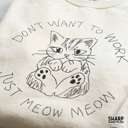 Cute lazy cat sketch with charcoal-textured lettering reading Dont Want To Work Just Meow Meow, ideal for custom t-shirts, tote bags, and DIY projects.