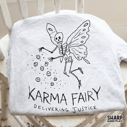 Retro-style black and white illustration of a skeleton fairy with butterfly wings and falling skulls, ideal for print-on-demand shirts and dark academia crafts.
