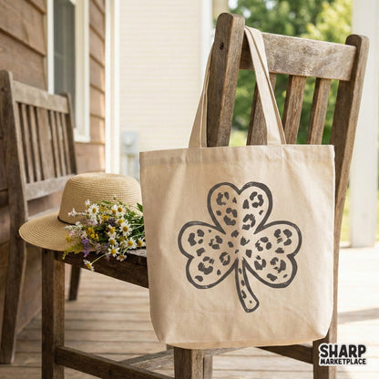 Monochromatic charcoal grey shamrock with a trendy animal print fill, a versatile digital file for festive St. Patrick's Day crafts and apparel.