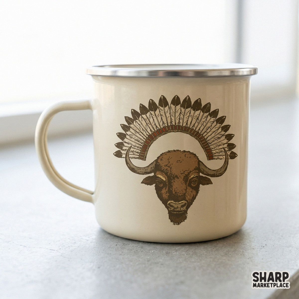 Vintage-style bison head with a majestic feather crown printed on a metal camping mug, ideal for rustic apparel and home decor inspiration.