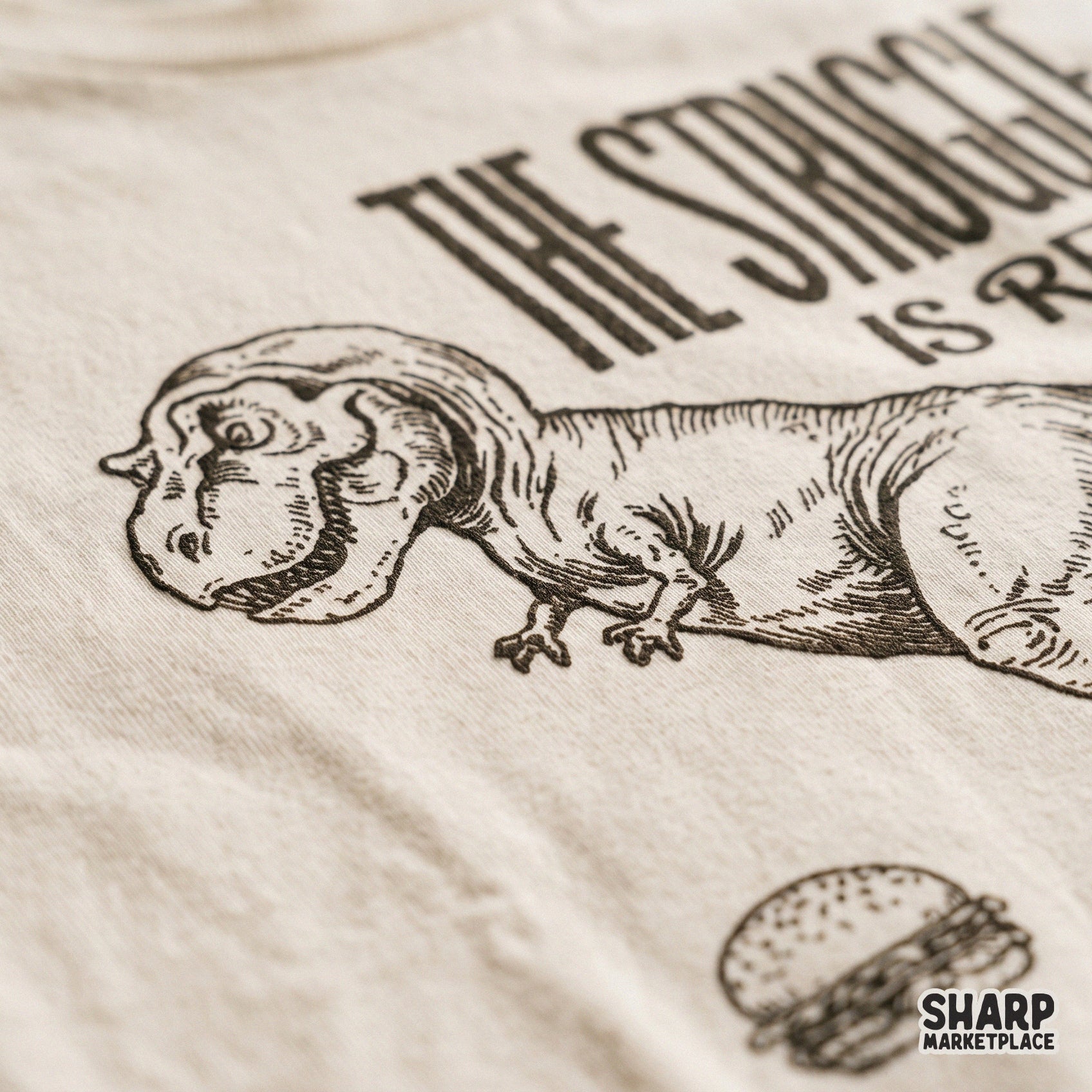 Funny T-Rex dinosaur trying to eat a burger with short arms retro PNG for trendy sublimation shirts and kids apparel