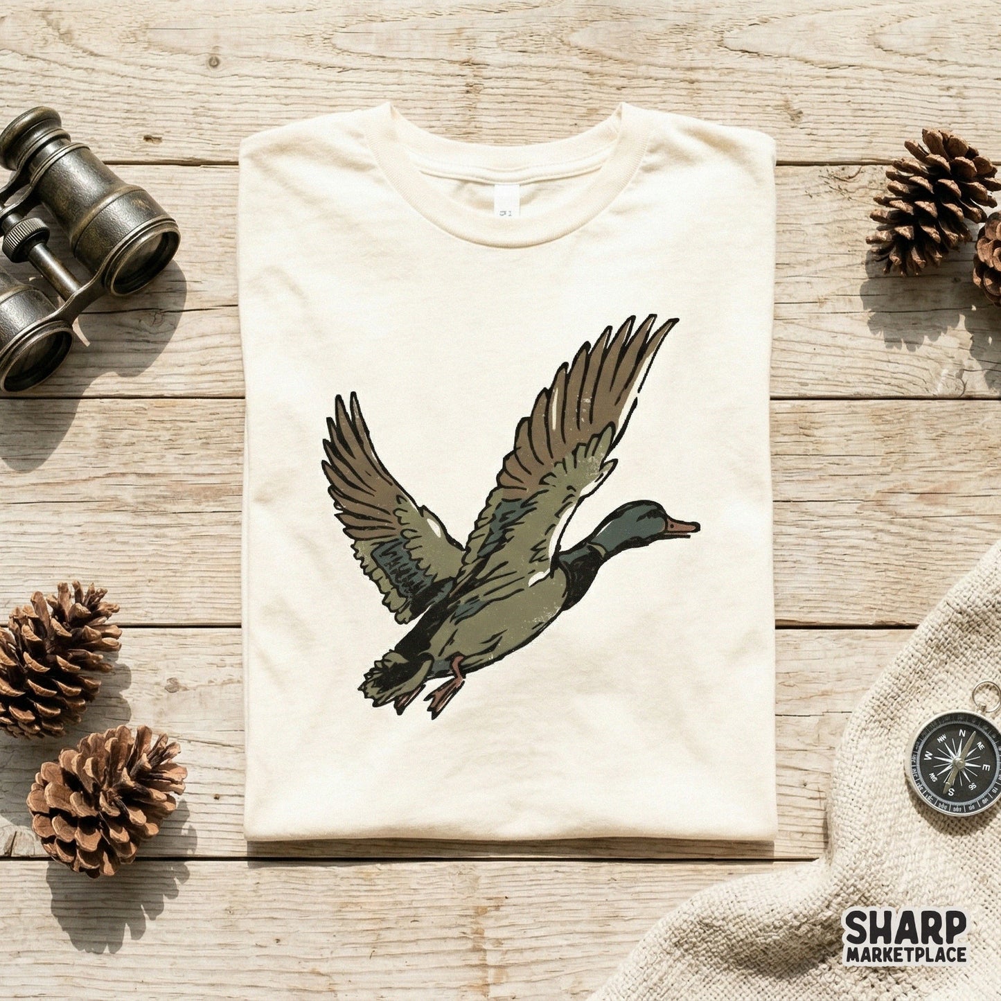 High-resolution digital download of a flying mallard duck with thick black outlines and muted colors perfect for sublimation and custom shirt printing.