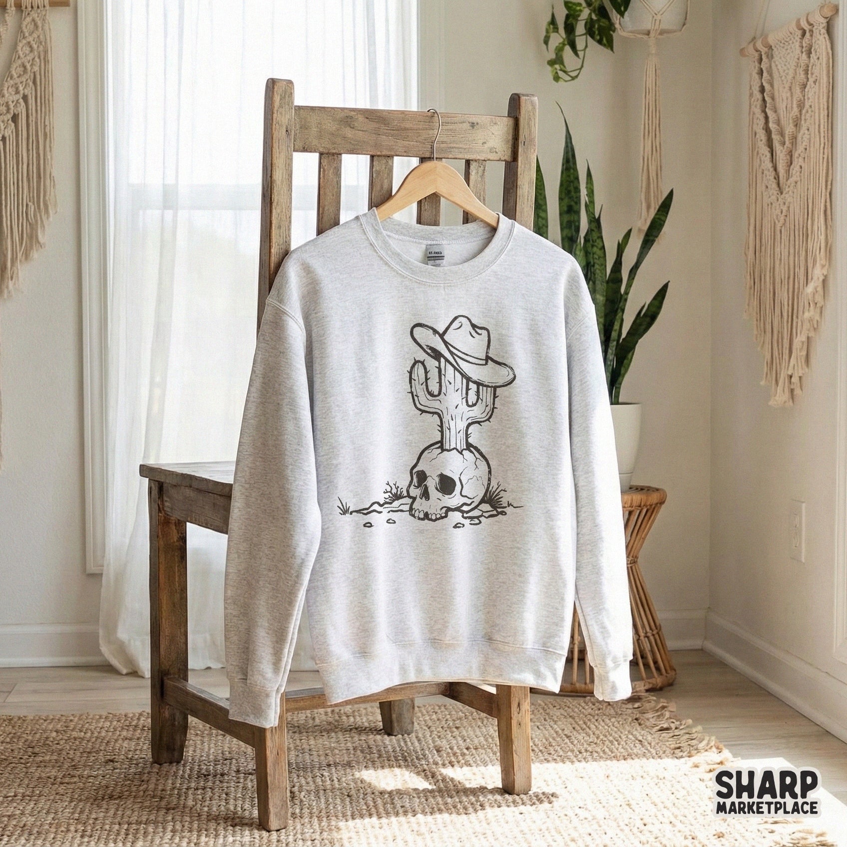 Detailed desert-themed skull artwork with a cactus and cowboy hat, ideal for creating custom western apparel, wall art, and unique printable gifts.