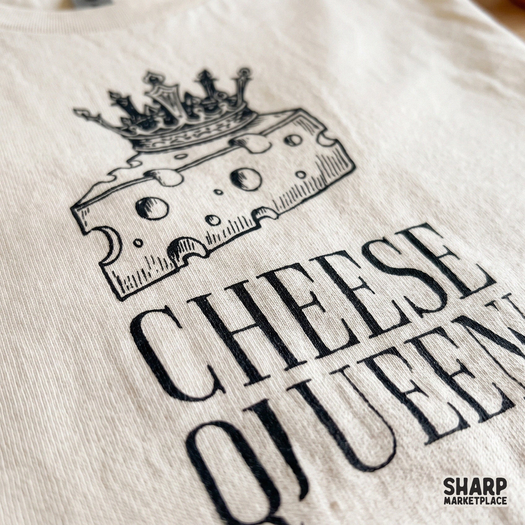 Funny retro cheese slice wearing a crown design for a Cheese Queen snarky foodie graphic tee and digital download PNG