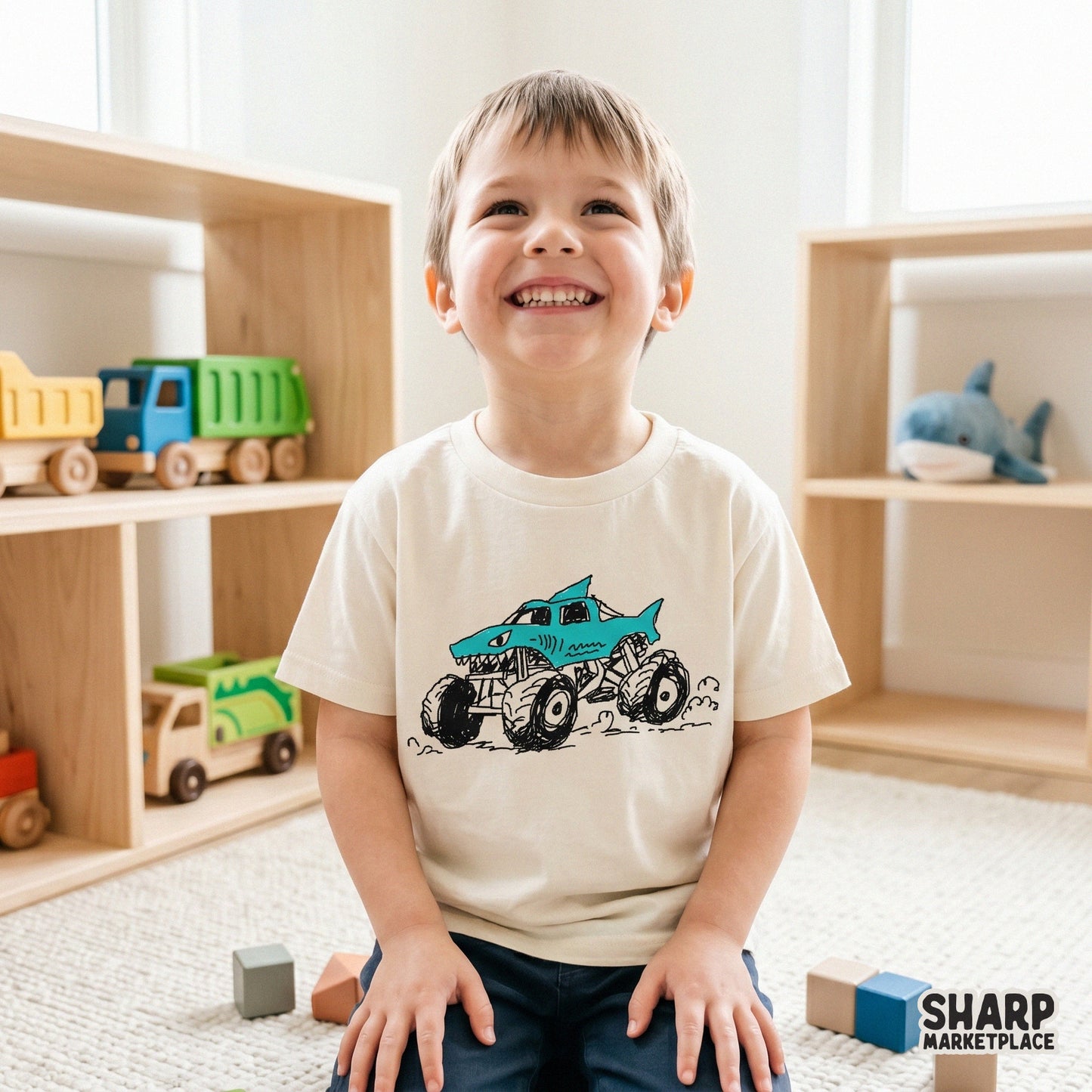 Playful shark monster truck design featuring bold black ink outlines and a bright blue finish, perfect for kids racing shirts and trendy streetwear.