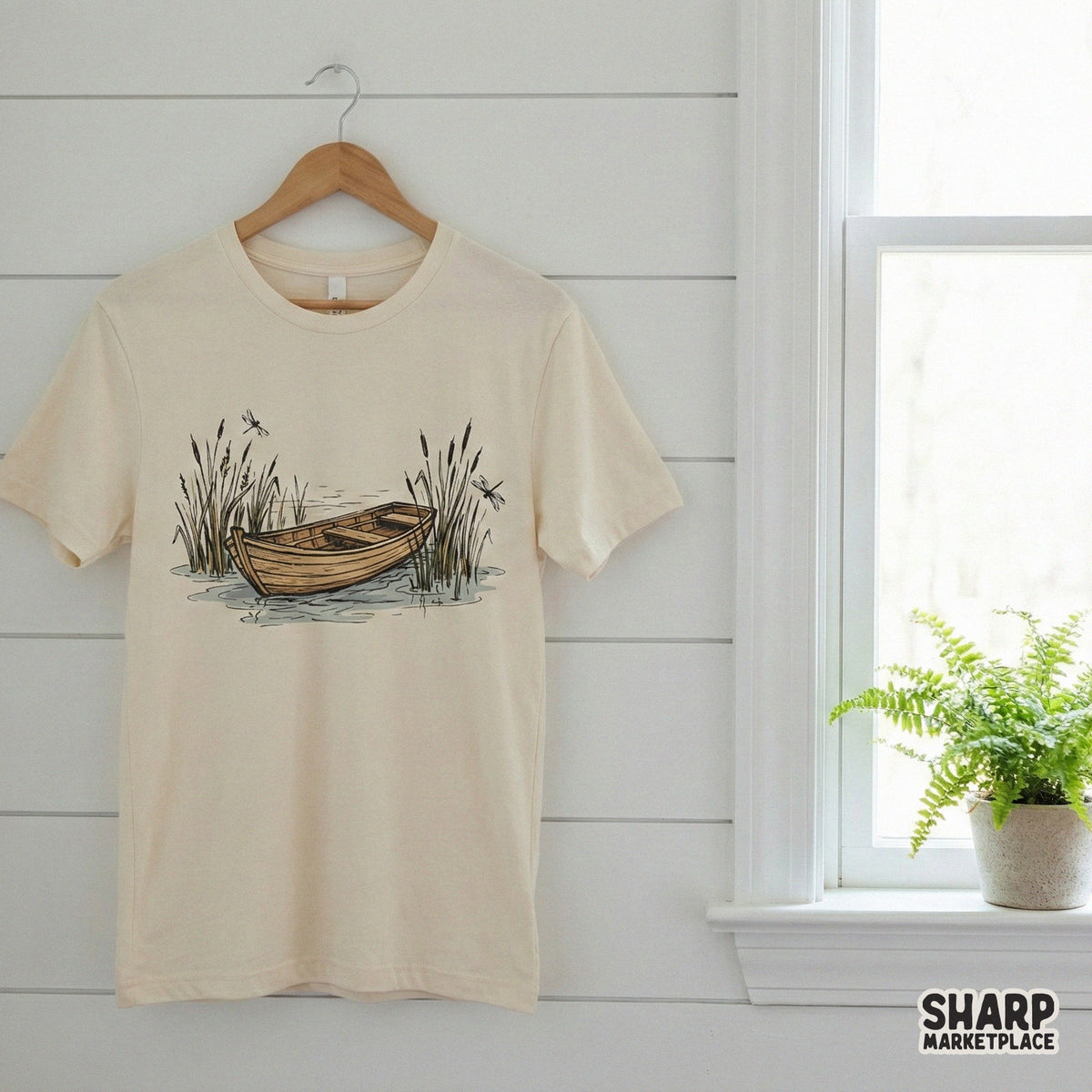 Serene lakeside scene featuring a vintage rowboat and marsh reeds, ideal for creating custom outdoor-themed stickers, tumblers, and home decor.