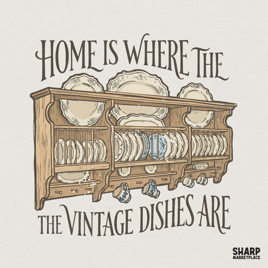 Cottagecore kitchen digital design featuring a rustic wooden shelf filled with vintage plates and mugs, with the whimsical text Home Is Where The Vintage