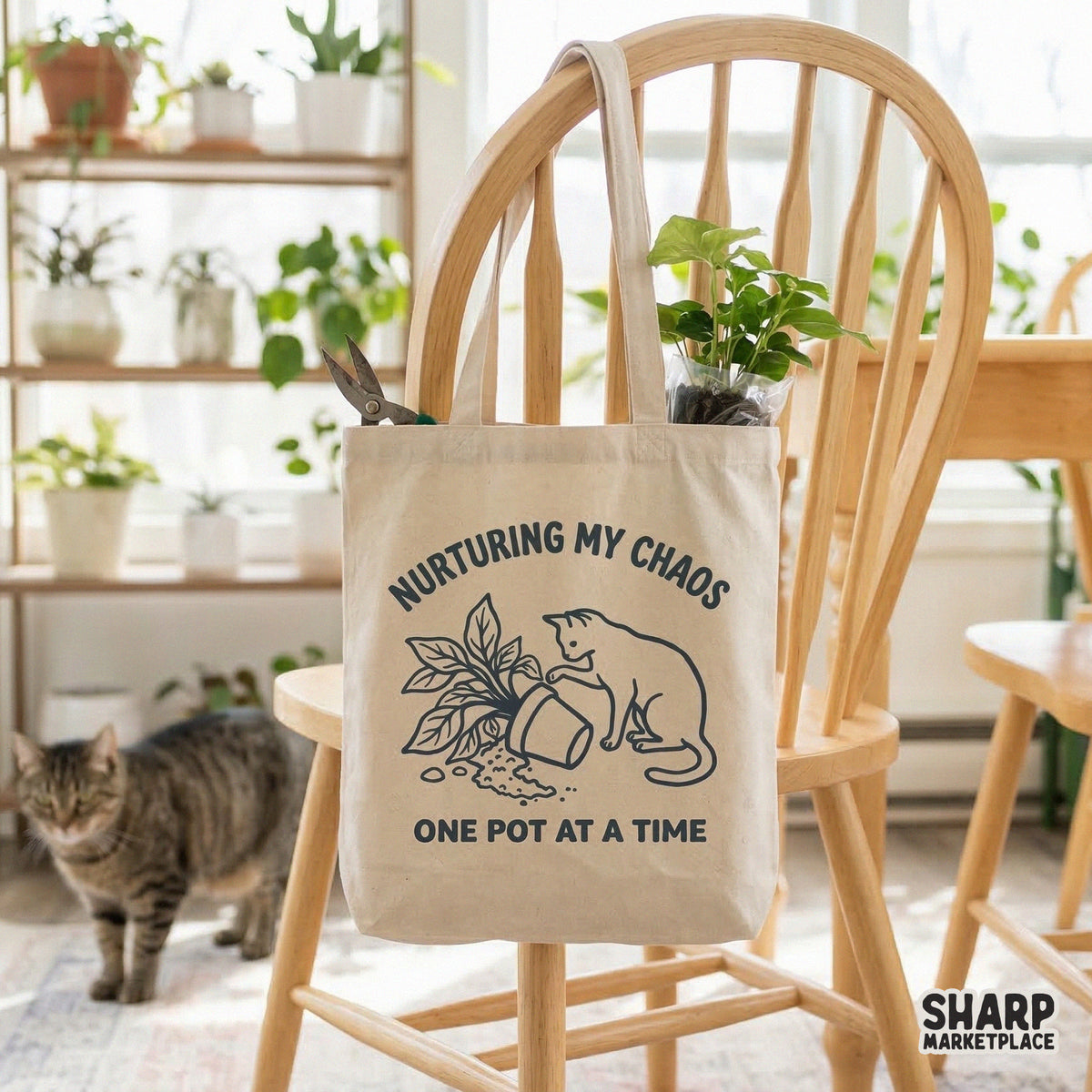 Digital sublimation design featuring a playful cat spilling a plant pot with bold typography, perfect for custom cat mom apparel and plant lover gifts.