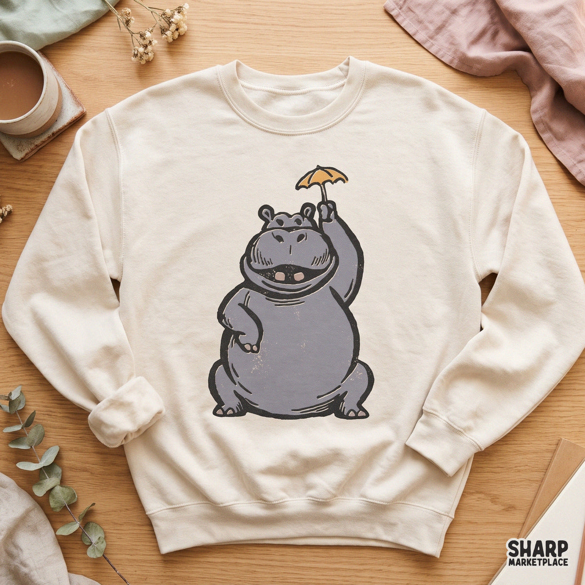 Cute chubby hippo holding a yellow umbrella, kawaii retro animal clipart ideal for funny birthday shirts and stickers
