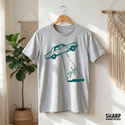 Vintage-style alien abduction graphic with a sketchy aesthetic, perfect for custom printable t-shirts, quirky wall art, or unique science fiction gifts.