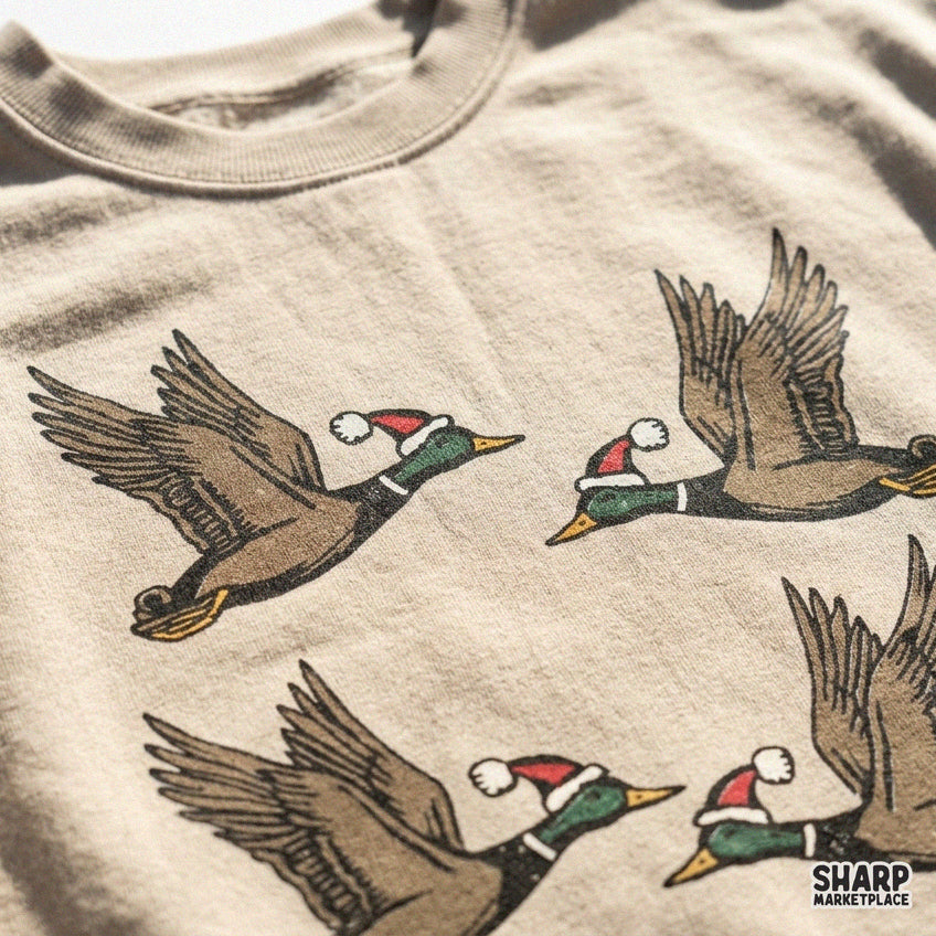 Flying mallard ducks wearing Santa hats festive Christmas PNG graphic for holiday hunting sublimation shirts