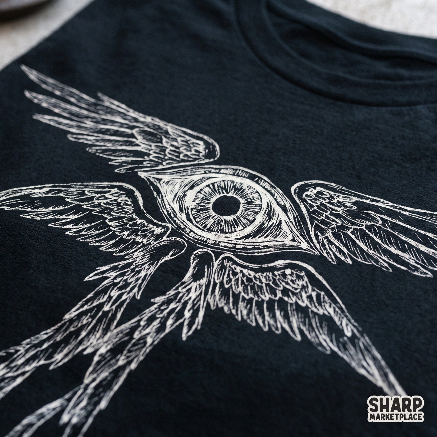 Biblically accurate winged eye angel illustration in a dark aesthetic tattoo style for spooky season Halloween t-shirts