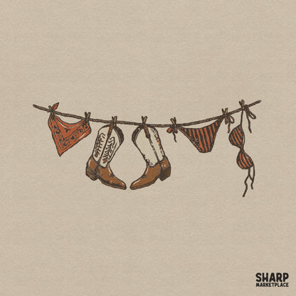 Hand-drawn western clothesline illustration featuring cowgirl boots, a bandana, and a striped bikini in earth tones for sublimation and apparel.