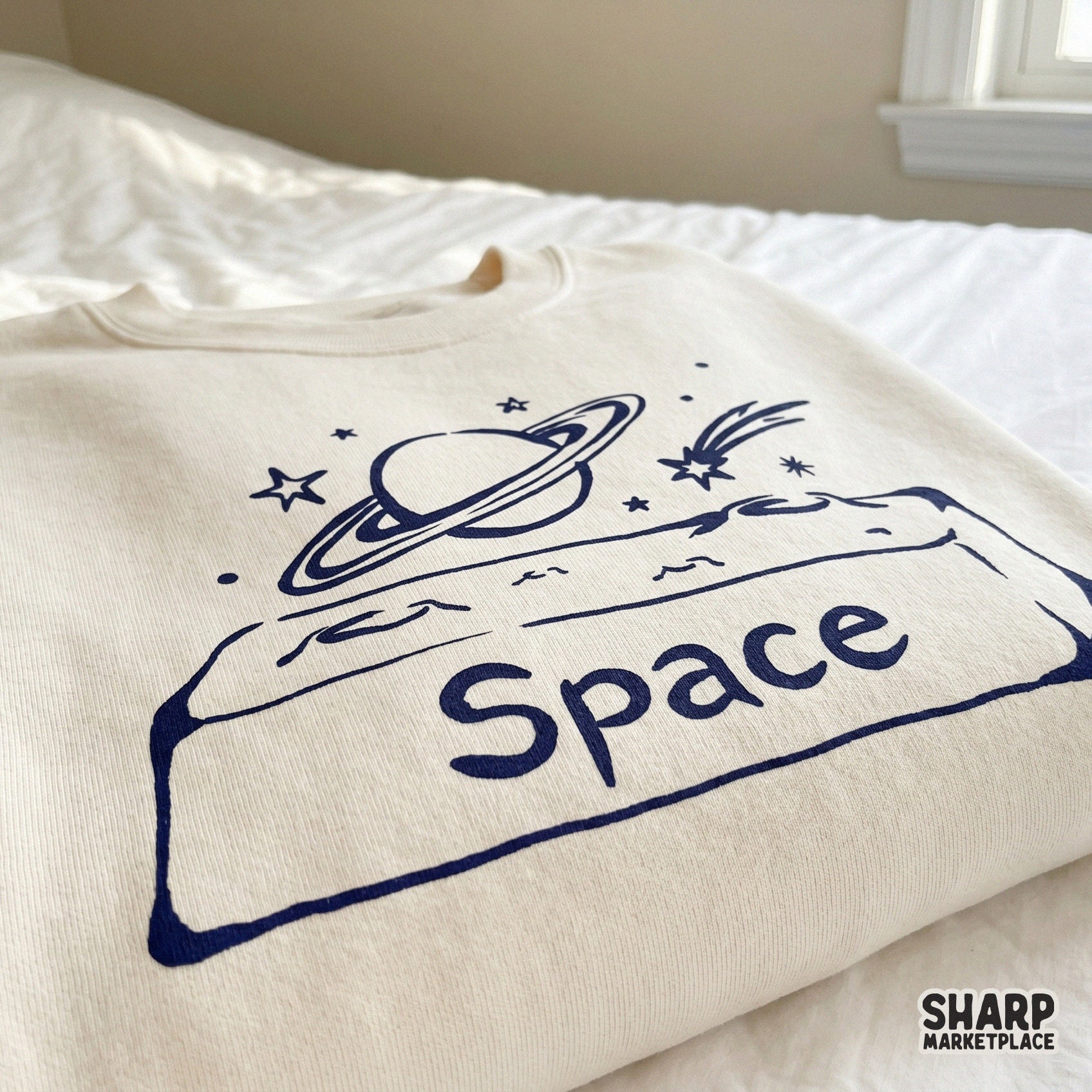 Versatile indigo ink-style space graphic with a planet and shooting star, perfect for DIY science shirts, school projects, or galaxy-themed decor.